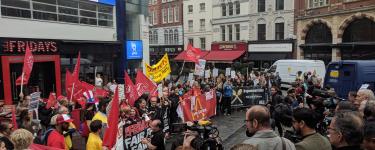 TGI Fridays, McDonald's and Wetherspoons workers take action in a protest outside a TGI Fridays in central London. Photo: War on Want.